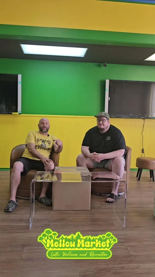 Ben and Hayden sitting inside Mellow Market during the store buildout